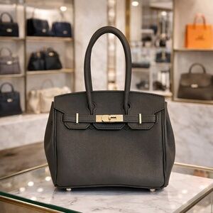 Leather hand sewn handbag